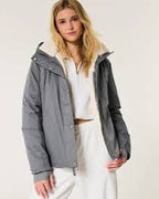 Hollister Faux Fur-Lined All-Weather Jacket in grey.